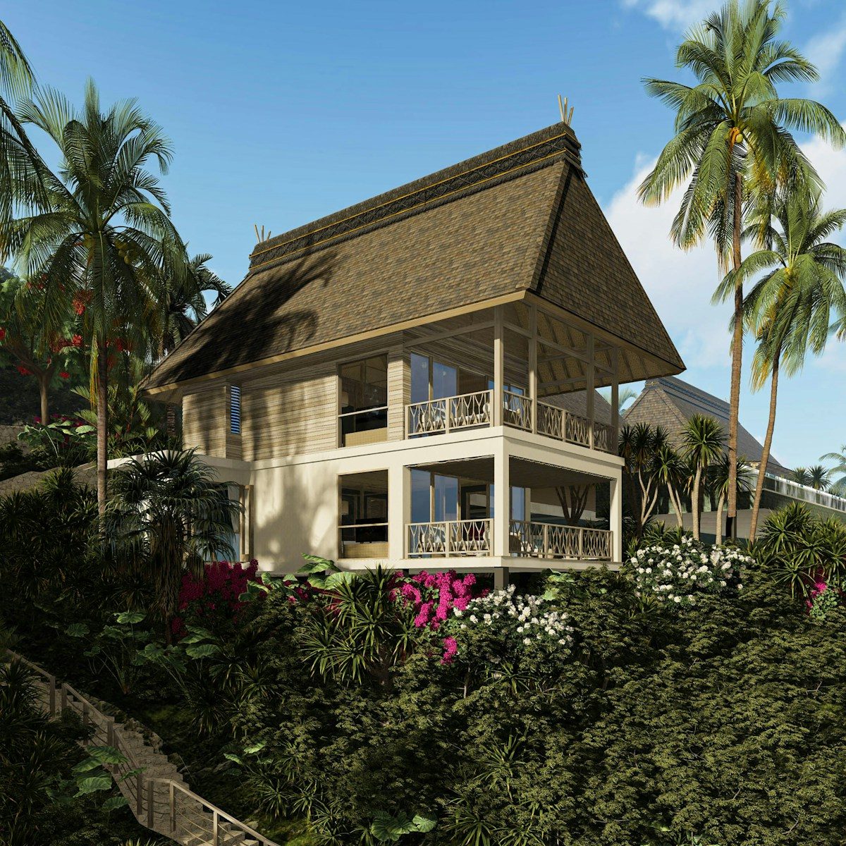 Tropical villa nestled among lush greenery and palm trees.